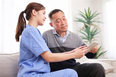 A Nurse Was Caring For The Elderly At Home Stock Image Image Of