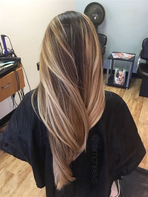 This look injects some life into dark chocolate brown curls, thanks to the touch of caramel blonde highlights at the ends. Warm golden honey sandy platinum medium blonde balayage ...