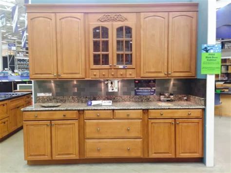 A curio cabinet can stand as a formal piece of furniture in a dining room, den or front entrance of a home. Kitchen cabinet display from Lowe's- Shenandoah Winchester ...