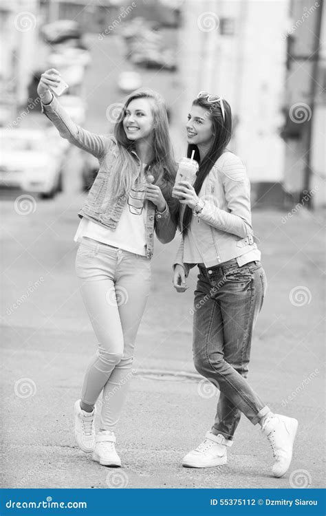 Hipster Girlfriends Taking A Selfie In Urban City Stock Photo Image