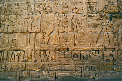 Ancient Hieroglyphs On Wall Temple Of Karnak Located At Modern Day
