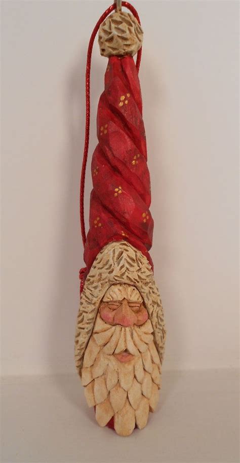 Here's a fun little beginner woodcarving project for christmas. Hand Carved Victorian Santa Ornament (With images) | Santa ...