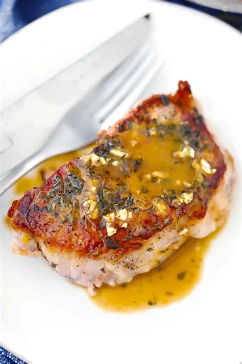 Juicy Oven Baked Pork Chops With Garlic And Herbs Bowl Of Delicious
