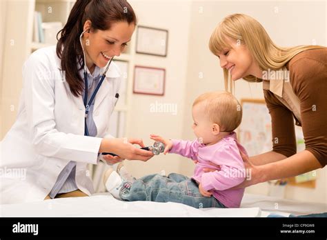 Cute Baby Being Examine By Pediatrician With Stethoscope Stock Photo Alamy