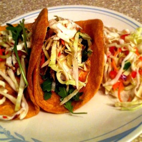 A crisp, spicy cabbage slaw makes the perfect topper. Tilapia fish tacos with cole slaw | Fish tacos tilapia ...