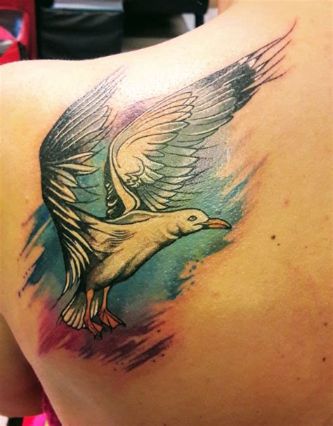 Black four flying seagull tattoo on wrist. Seagull tattoo | Tattoos, Seagull tattoo, Animal tattoos