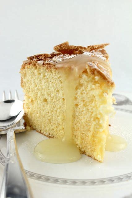 It's pretty hard to beat a featherlight sponge cake and this one's no exception. Passover Lemon Almond Sponge Cake with Warm Lemon Sauce | Desserts, Passover recipes, Food