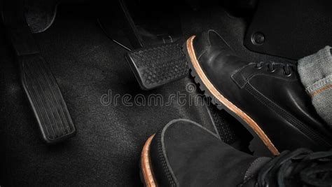 Man Foot And Accelerator And Brake Pedal Inside The Car Stock Image
