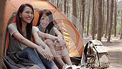 Lgbt Lesbian Women Couple Camping Or Picnic Together In Forest