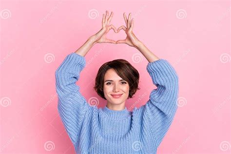 Portrait Of Gorgeous Positive Lady Arms Make Heart Symbol Above Head Isolated On Pink Color
