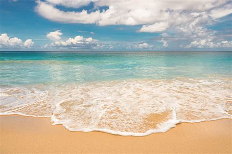 Soft Wave Of Blue Ocean On Sandy Beach Stock Photo Download Image Now