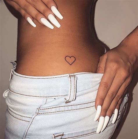 Cute lower back tribal tattoo for girls cool tattoos car pictures. Heart-Shaped Tattoo | NOT MY WORK | follow @ariellanita ...