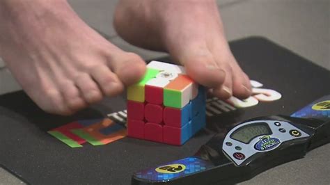 New York Teen Masters Solving A Rubiks Cube With His Feet