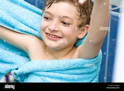 Boy After Bath In Blue Towel Play Stock Photo Alamy
