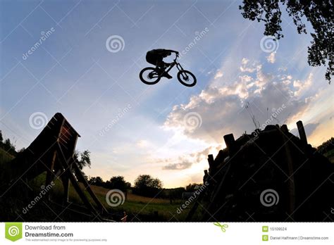 Launching off a jump and flying through the air is probably one of the most intoxicating aspects to riding a dirt bike but also the hardest to learn. Extreme Bike Jump Silhouette Stock Photo - Image of free ...