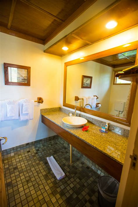 The cozy living space awaits you in liu resorts. All Inclusive Fiji Vacation Two Bedroom Bure - Koro Sun