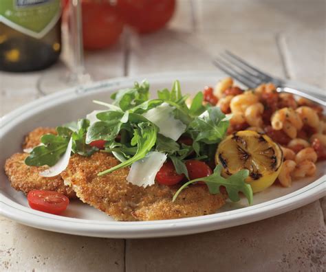 Toss a bowl of fresh arugula with dressing and set aside. Carrabba's Italian Grill Copycat Recipes: Parmesan Crusted Chicken Arugula
