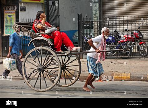 Man Pulling Rickshaw In Calcutta India Stock Photo Alamy