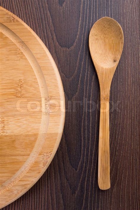 Wooden Spoon And Serving Plate Stock Image Colourbox