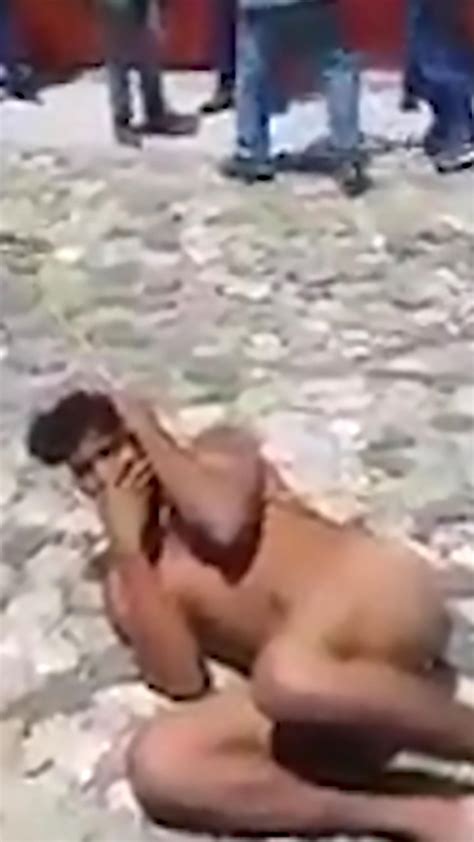 Angry Mob Strip Mobile Phone Thief Totally NAKED And Drag Him Through