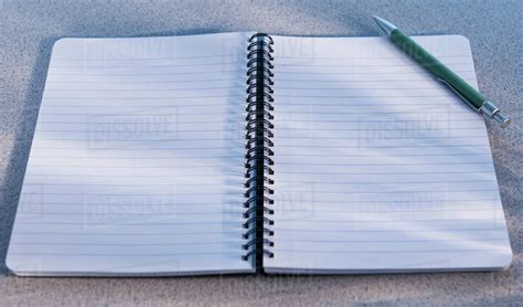 Blank Open Notebook And Pencil Stock Photo Dissolve