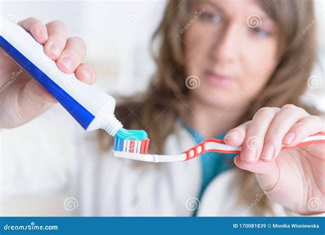 Smiling Woman Holding Toothbrush Stock Image Image Of Brunette