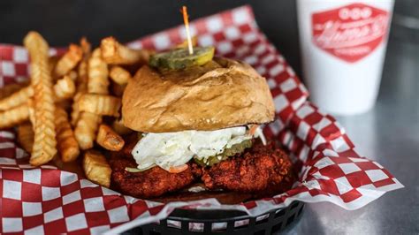 Tourists and locals in search of southern comfort makes the trek to the big turquoise house in north charleston to take in the dishes established by the late founder albertha grant, like the smothered pork chops and oxtails. Nashville's Hot Chicken sandwich : food