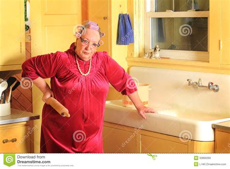 Grumpy Senior Granny With Rolling Pen Royalty Free Stock