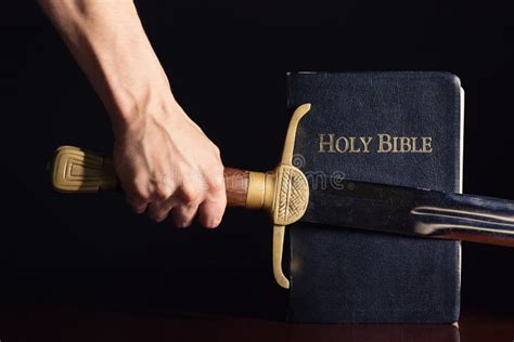 Young Athletic Man With His Bible And Sword Stock Image Image Of