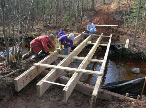 How To Build A Wooden Bridge Over A Creek Outdoor Bridges Wooden