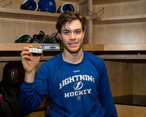 The lightning roster is loaded. Brayden Point poses with the puck from his first NHL Goal ...
