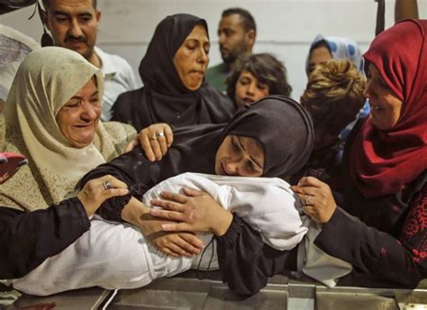 Sobbing Mother Holding The Dead Body Of Her 8 Month Old Tells The Story