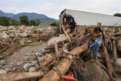 Colombia Mudslide Sends Rescuers And Relatives On Race To Find