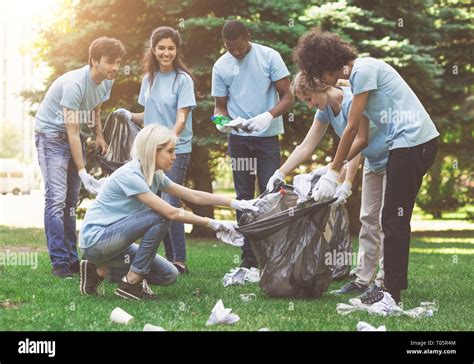 Young People Collecting Garbage Hi Res Stock Photography And Images Alamy