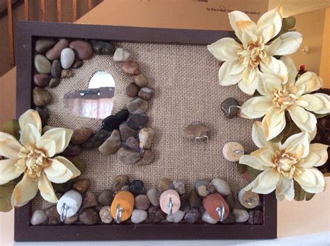 Jewelry frame DIY made of rocks corks flowers and burlap paper. Plus ...