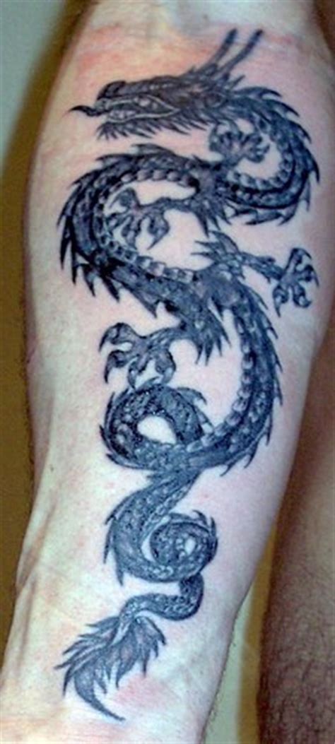 Feb 01, 2021 · the dragon arm tattoo is definitely a favorite for guys. Black angry thorny dragon forearm tattoo - Tattooimages.biz