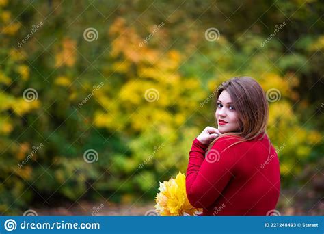 Happy Beautiful Woman In Autumn Cute Plus Size Model In Red Sweater