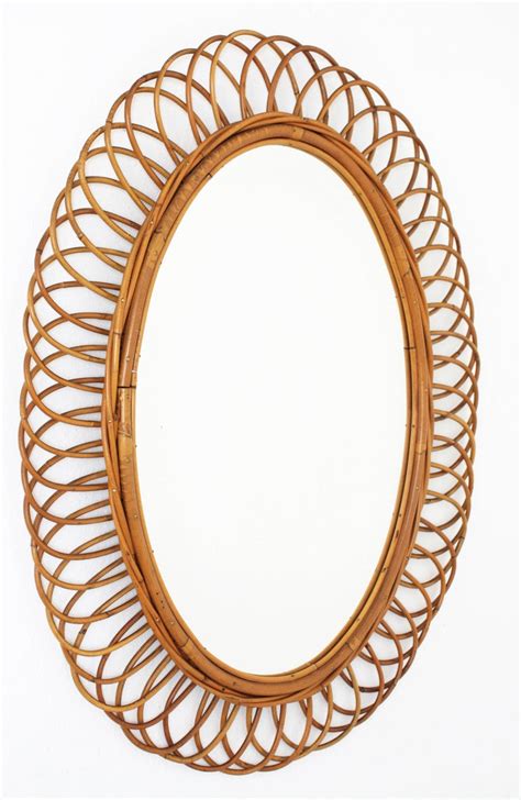 Biface irregular pebble mirror, large. Large Rattan and Bamboo Flower Shaped Oval Mirror, Spain ...