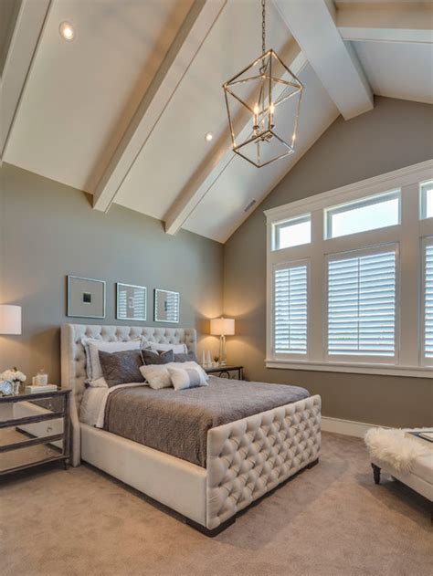 The cozy living room features a dark wood plank cathedral ceiling that extends to the walls. Cathedral Ceiling Design Ideas | Houzz