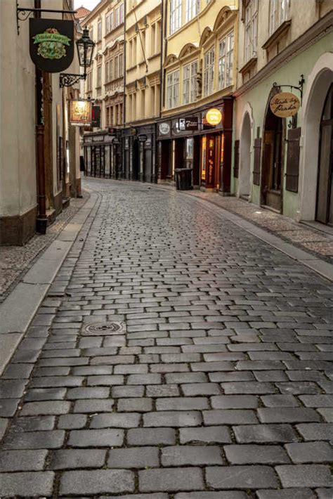 Cobblestone Streets In The Old Town Of Prague Print By Chuck Haney