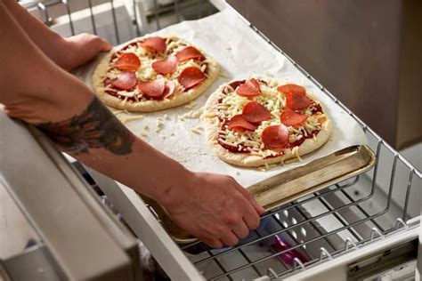 How To Make Frozen Pizzas At Home Kitchn Freezer Meal Planning Freezer Meals Freezer Cooking