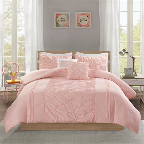 The pleated finish provides texture and added interest to the decor. Intelligent Design Shayda 4-Piece Blush Twin/Twin XL Solid ...