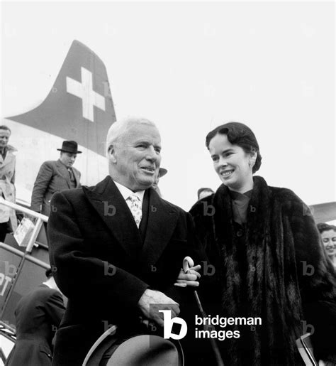 Image Of Charlie Chaplin And Wife Oona Arriving In Paris Airport April