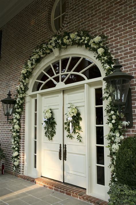 front door of a wedding ceremony at a home | Front door wreaths diy
