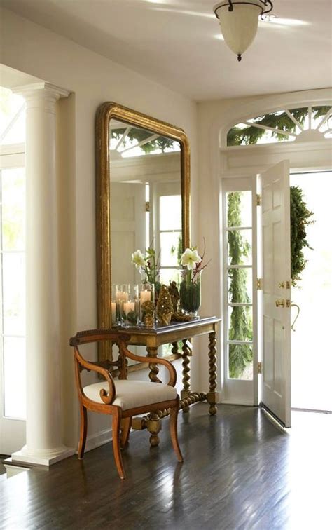 A mirror hung to reflect a window gives the illusion of another window in the room. How To Decorate With Mirrors