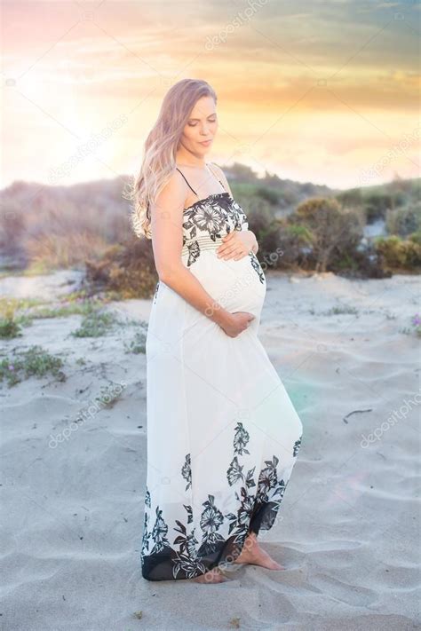 Pregnant Woman On Beach Stock Photo Phase4studios 90043124