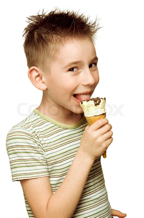 Eighth Year Boy Eating Ice Cream Isolated On White Stock Image