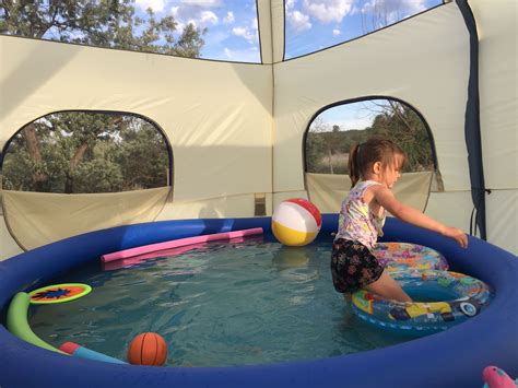 Convince unwanted swimming pool water bugs, and other insects as well, that your pool is closed for the season. Inflatable pool placed inside of large tent with screened ...