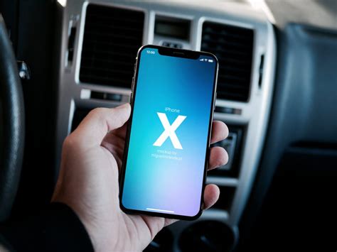 You can easily change your design with smart object. iPhone X in Car Mockup | Mockuptree