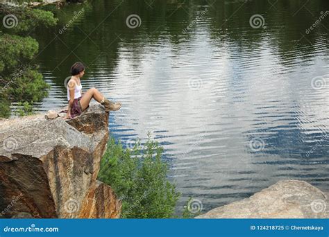 Young Woman On Rocky Mountain Near Lake Stock Image Image Of